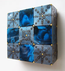 a deep blue and black steel wall piece by Peter Diepenbrock
